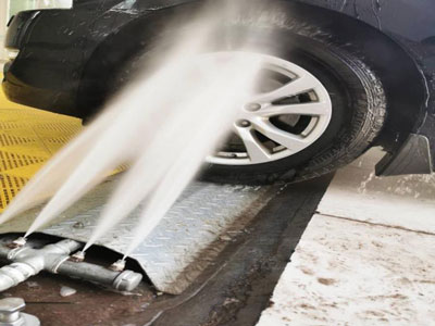 High-pressure undercarriage wash